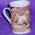H�bsche Tasse mit Hundekindern und K�ken