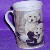 H�bsche Tasse mit Hundekindern und Ente