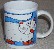 Tasse Die Turnschuhkatze mit blauem Hintergrund